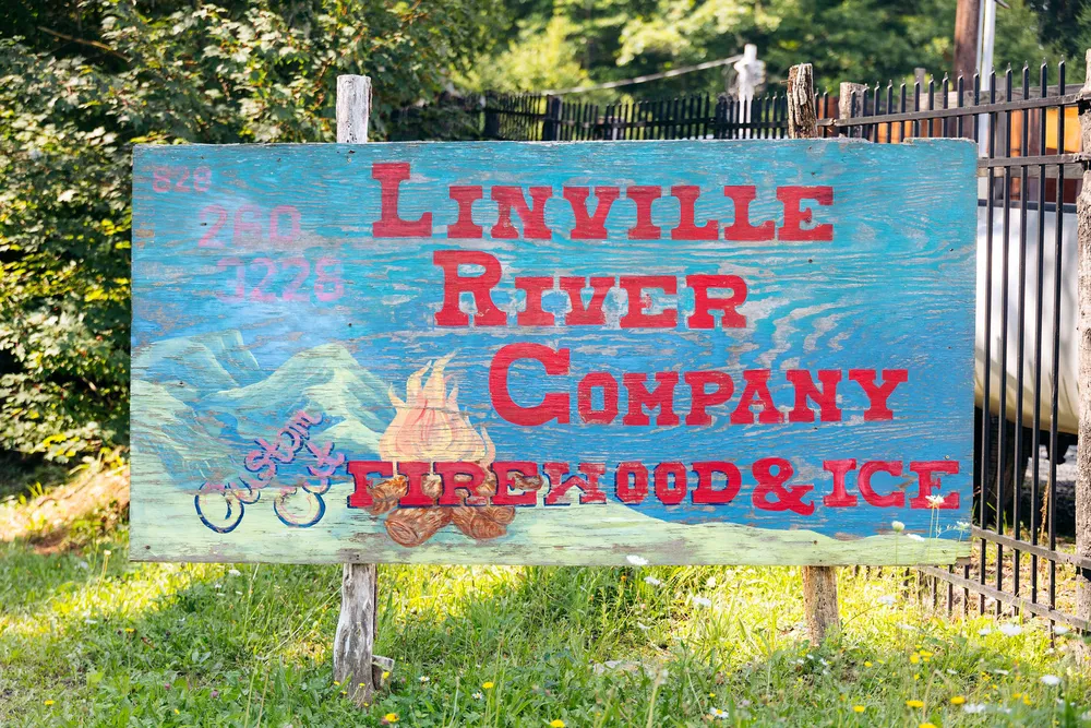 The hand-painted Linville River Company Firewood & Ice sign at the Newland facility